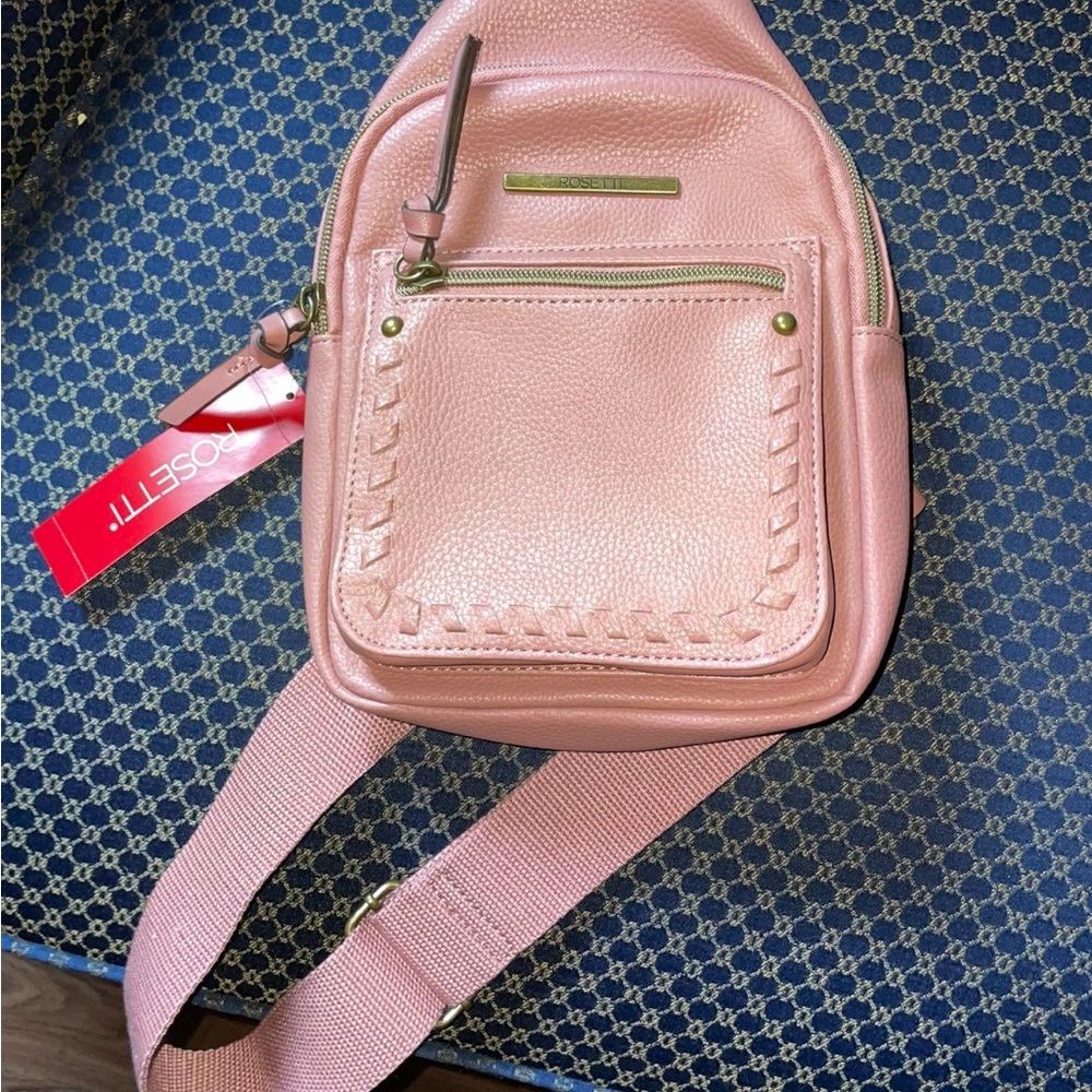 Rosetti Pink Mini Backpack with Textured Material and Gold Accents